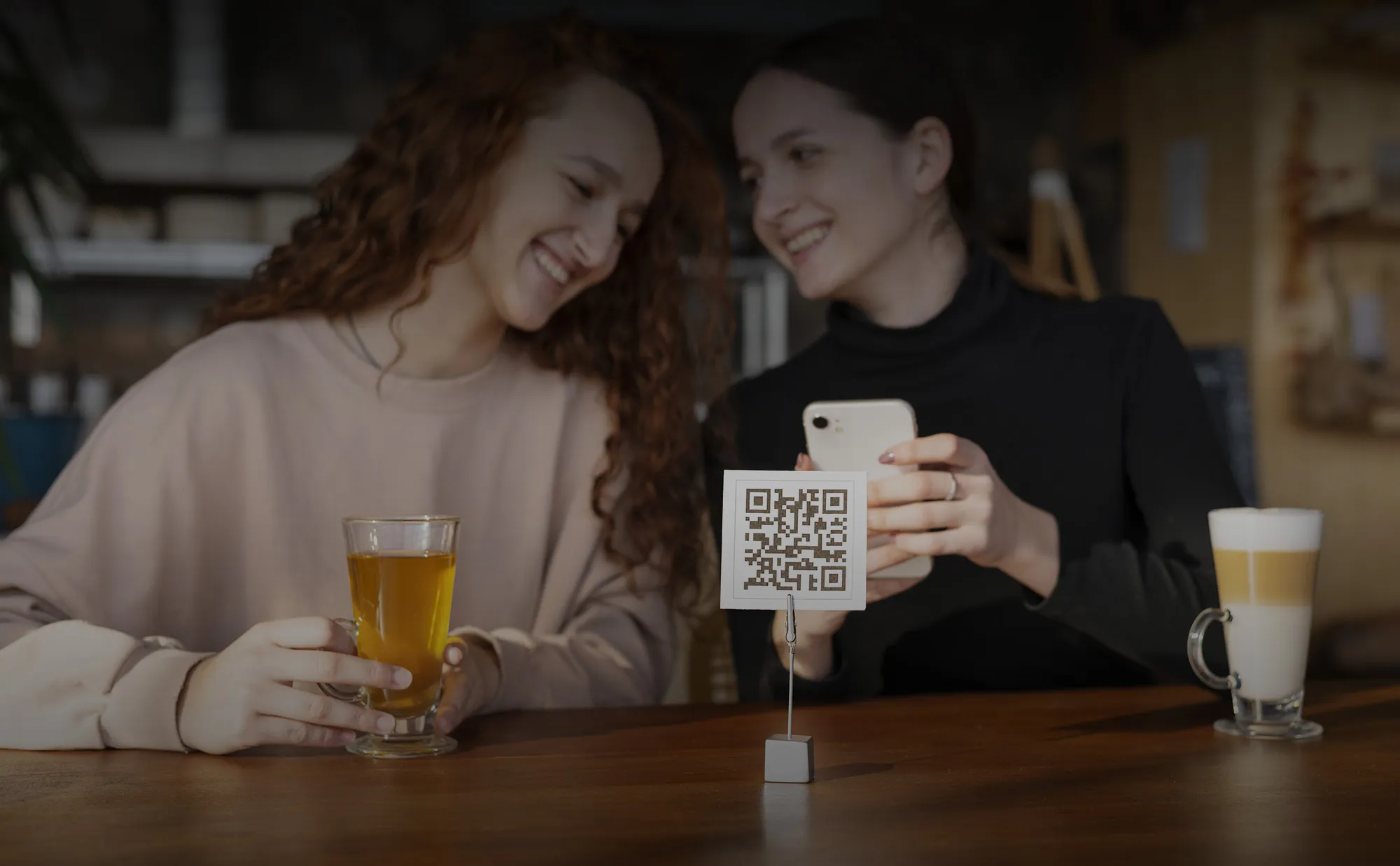 Customer making a contactless payment on iPhone