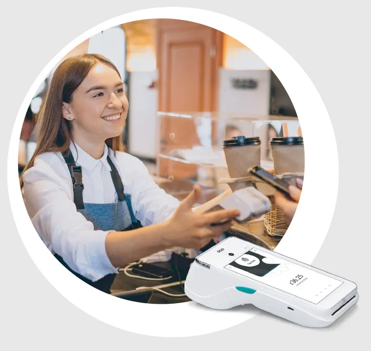 Staff member using a Dojo payment device with a customer